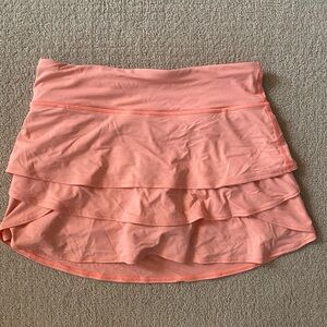 light orangee athleta girl skirt